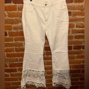 White fitted lace bottom bell-bottom jeans